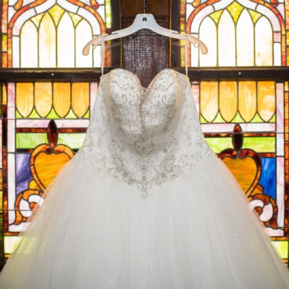 Beaded illusion bodice ball gown wedding dress